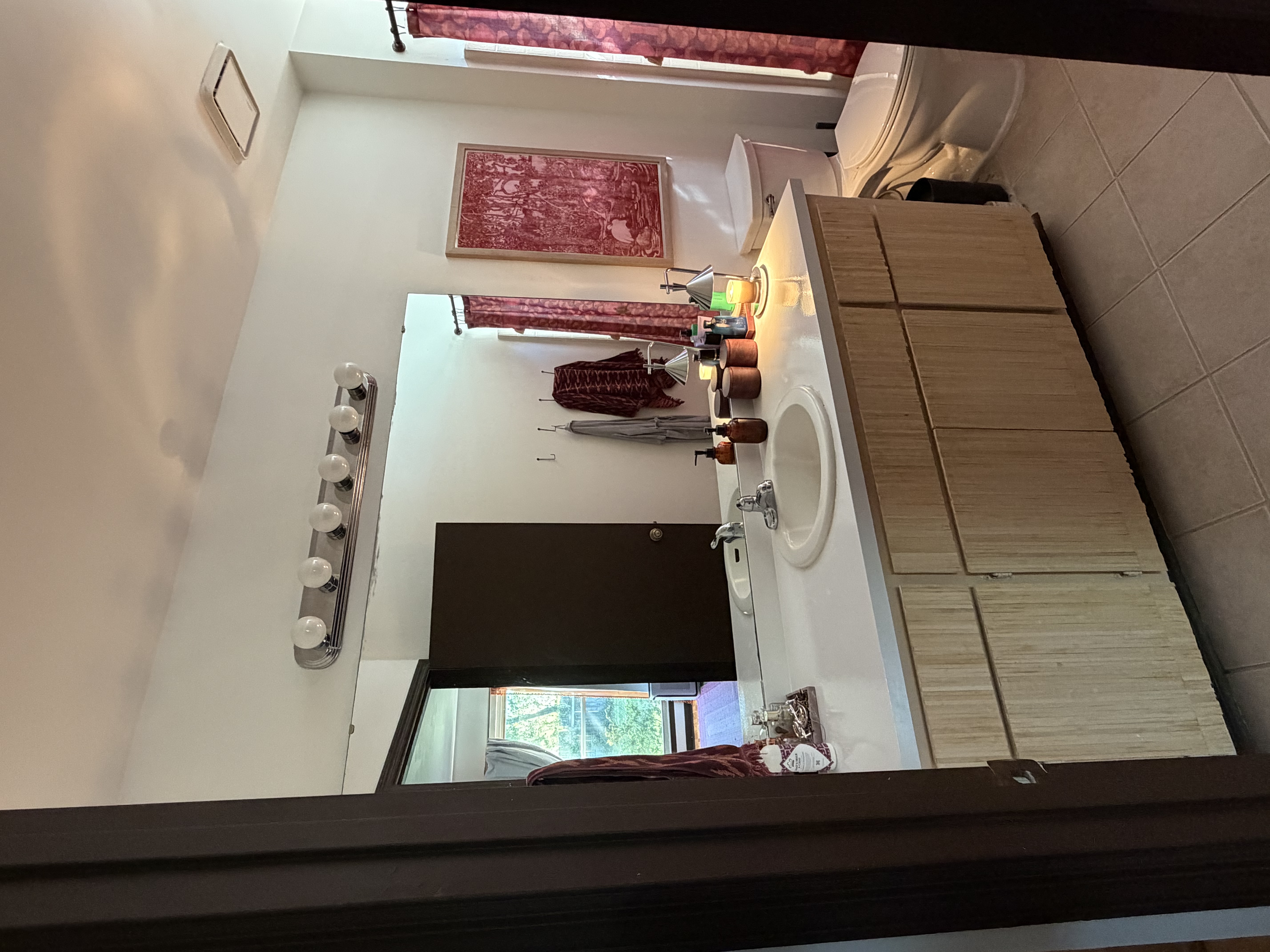 Beautifully decorated and clean bathroom with modern fixtures and bright lighting