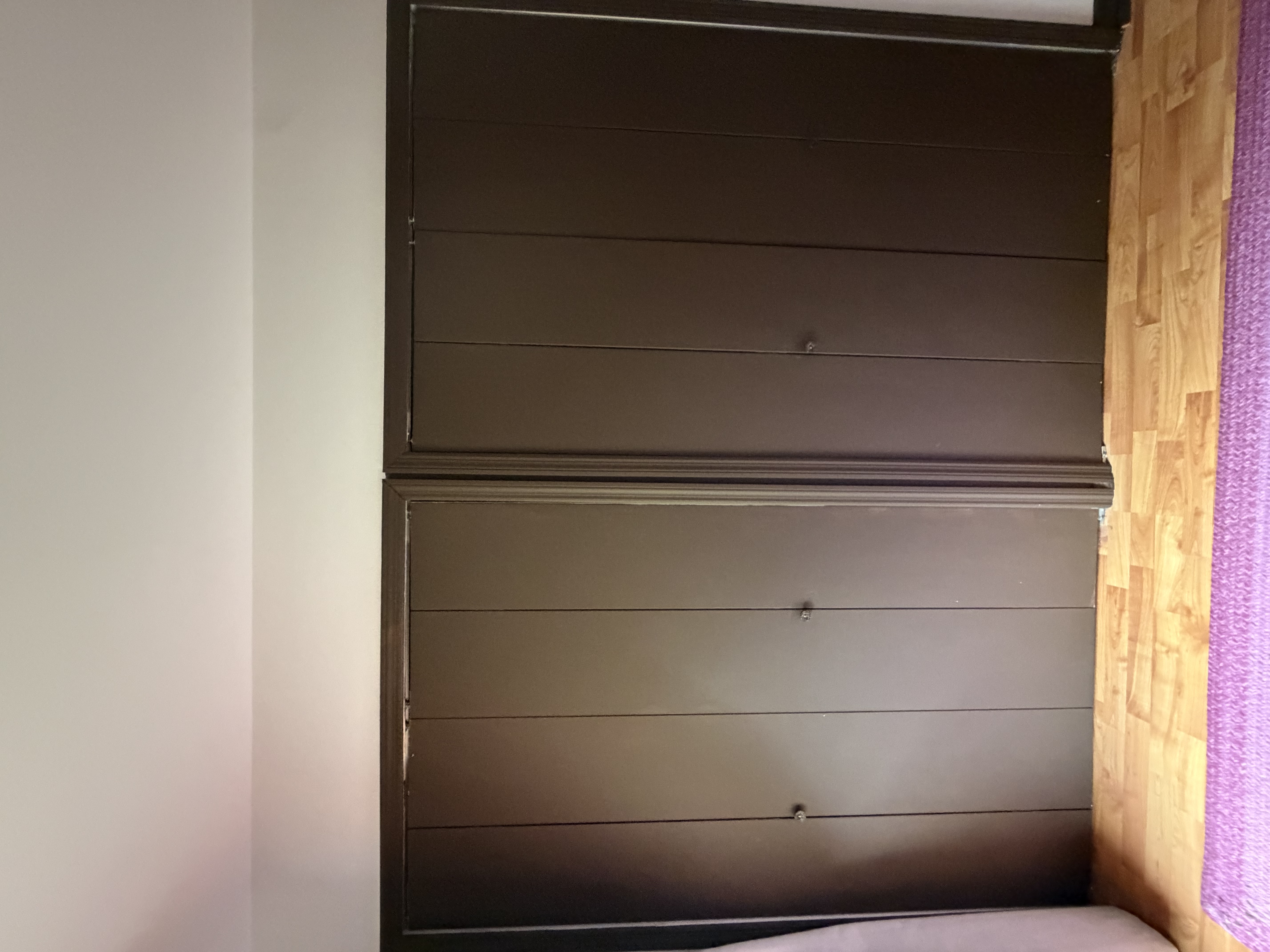 Bright main bedroom with natural lighting, cotton linens, and cozy textile details